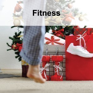 Chaussures de course et haltères sous un sapin de Noël